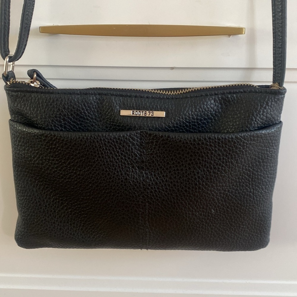 ROOTS 73 Small Black Crossbody Bag with adjustable strap great for travel